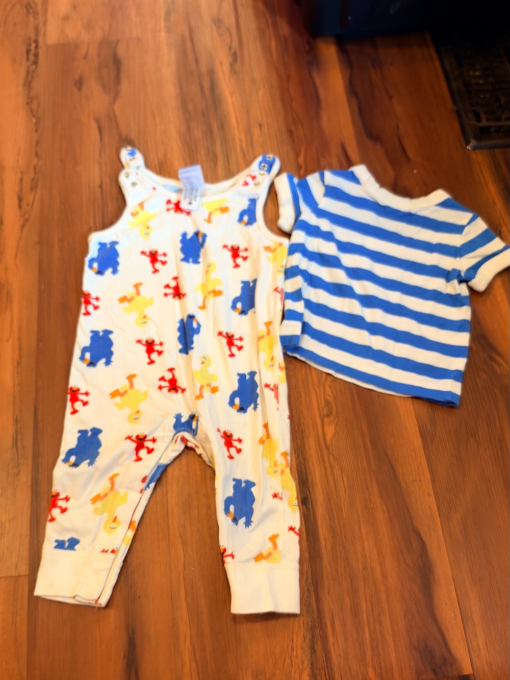 Sesame Street White Footie One-Piece with Blue, Red & Yellow Character Prints